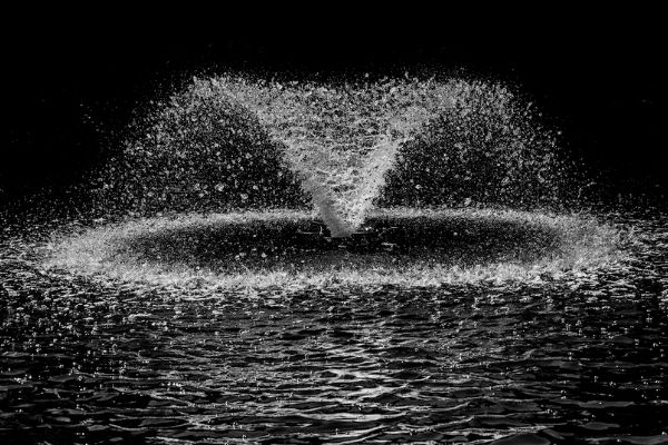 Water fountain in pond